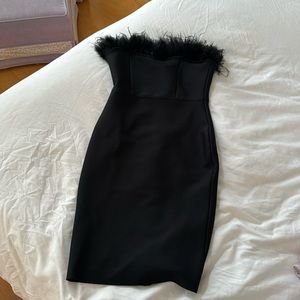 Bodycon mini dress with feather detailing